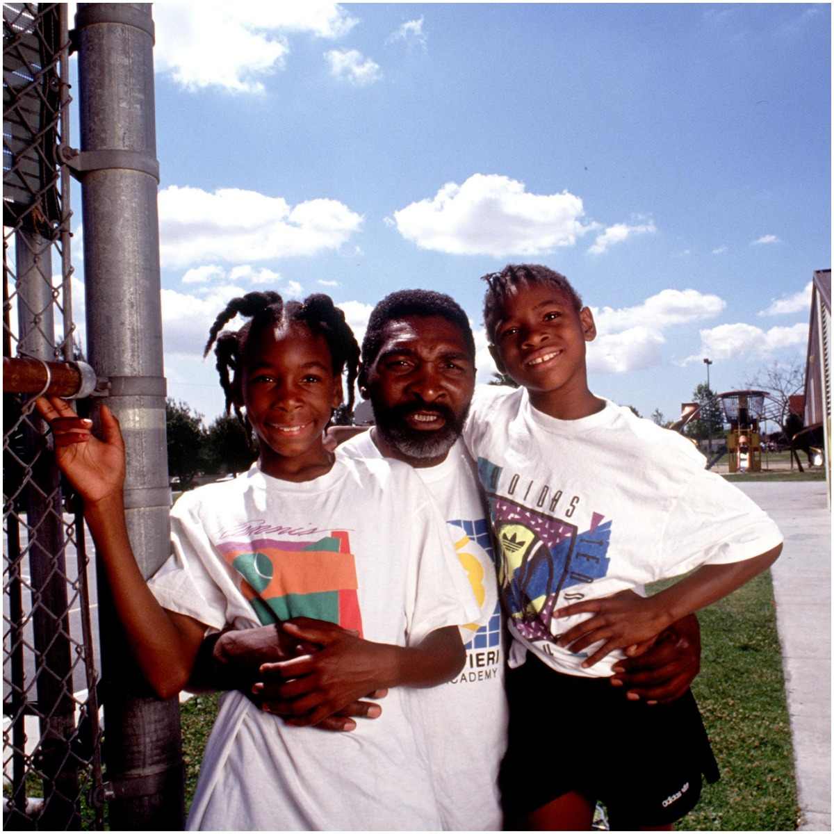 Serena Williams with Venus and her father