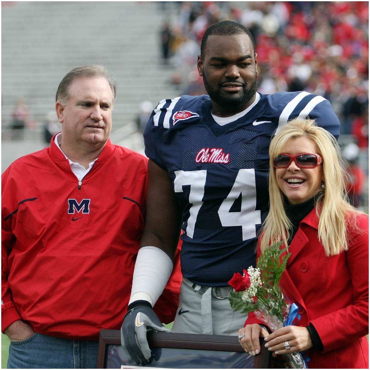 Michael Oher with his adoptive family