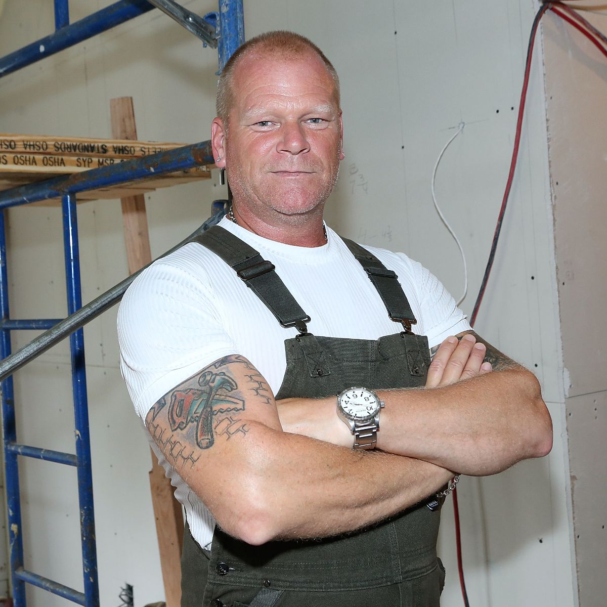 Are Russell J. Holmes and Mike Holmes related